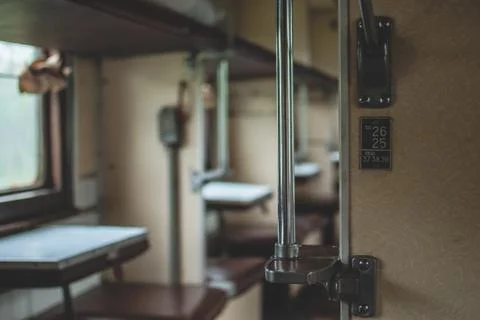 Old abandoned soviet train car. Places for passangers Stock Photos