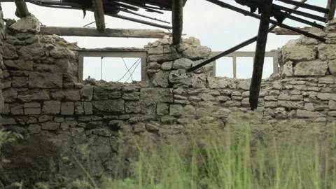 An old abandoned stone house without a roof was destroyed Stock Footage 165014836