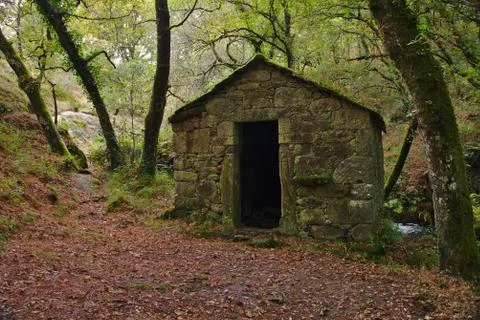 Old abandoned stone mill Stock Photos