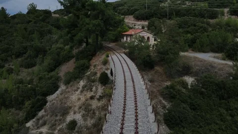 Old abandoned stone train bridge over the river Vidéo 346486486
