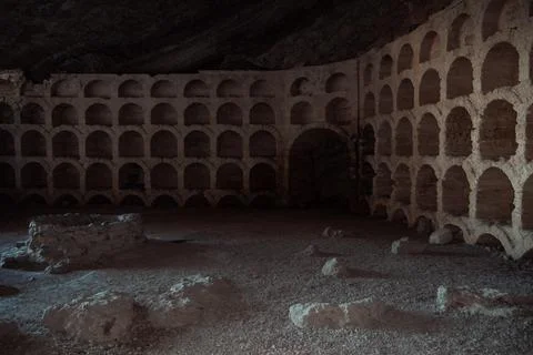 An old abandoned vault in a cave. Stock Photos