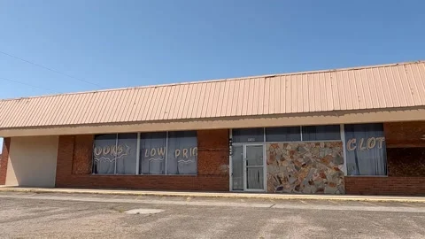 Old abandoned vintage 80s retail strip mall now red brick Stock-Footage 235649953
