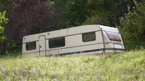 An old abandoned white trailer Stock Footage 168714282