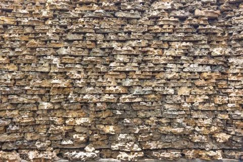 Old abstract pattern of stone wall decorative surfaces Stock Photos