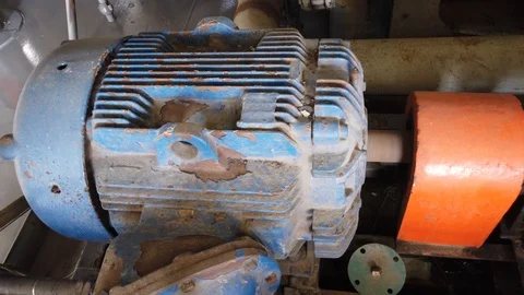 The old ac motor running to operate a pump Stock Footage 116502512