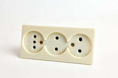 Old adapter from one connector to three plug connectors. Stock Photos