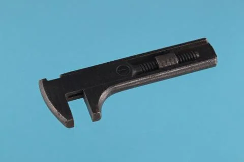 Old adjustable wrench or spanner. Stock Photos