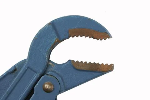 Old adjustable wrench with rust stains. Pipe wrench on a white background Stock Photos