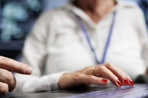 Old admins working in data center Stock Photos