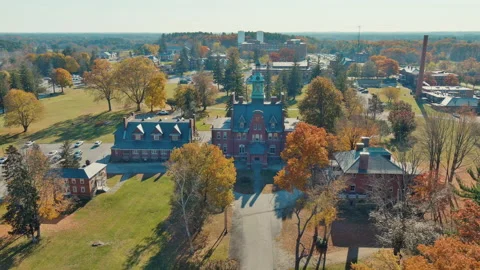 Old Adminstrative Building in Autumn with Colorful Leaves Vídeo Stock 166863461