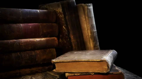 Old, aged, ancient and weathered books in a stack. Vintage. Stock Footage 60052746