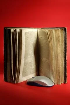 Old aged  book and computer knowledge technology 스톡 사진