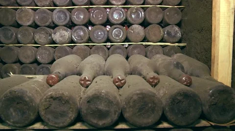 Old Aged Wine Bottles Storage in Dark Rustic Cellar Basement, Stack of Lying Dir Stock Footage 58483993