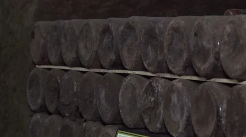 Old Aged Wine Bottles Storage in Dark Rustic Cellar Basement, Stack of Lying Dir Stock Footage 58484083