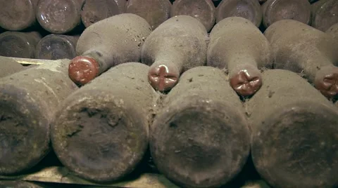 Old Aged Wine Bottles Storage in Dark Rustic Cellar Basement, Stack of Lying Dir Stock Footage 58484258