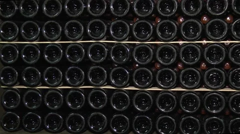 Old Aged Wine Bottles Storage in Dark Rustic Cellar Basement, Stack of Lying Dir Stock Footage 58484266