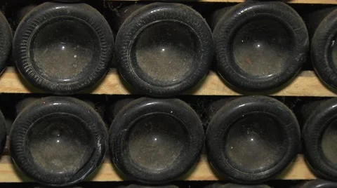 Old Aged Wine Bottles Storage in Dark Rustic Cellar Basement, Stack of Lying Dir Stock Footage 58485965