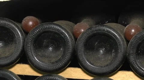 Old Aged Wine Bottles Storage in Dark Rustic Cellar Basement, Stack of Lying Dir Stock Footage 58486397