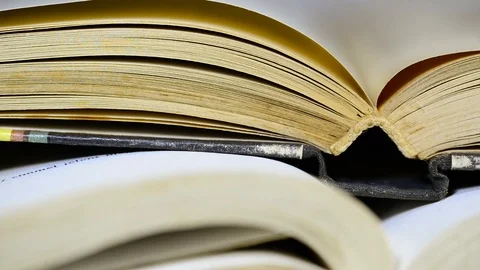 Old aged yellow opened book pages Stock Footage 126927894