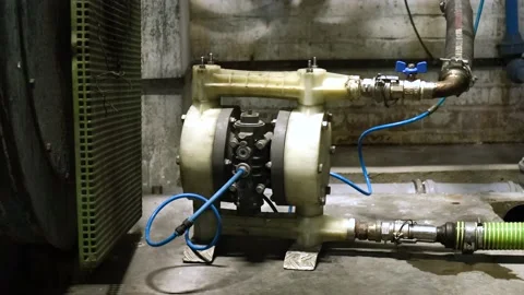 The old air compressor engine is running and shaking violently in the factory Stock Footage 147303147