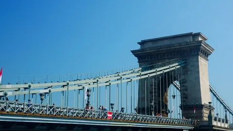 An old airplane flyes over the Chain bridge / Budapest Stock Footage 103166340