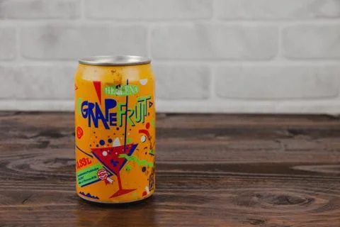 An old aluminium can of Hellena soft drink against the brick wall Stock Illustration