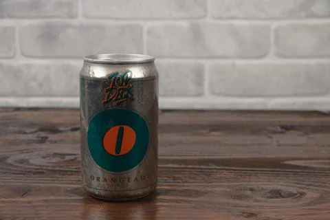 An old aluminium can of Top Deck soft drink against the brick wall Stock Illustration