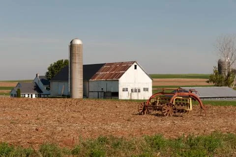 Old Amish farm and Old farm equipment Stock Photos