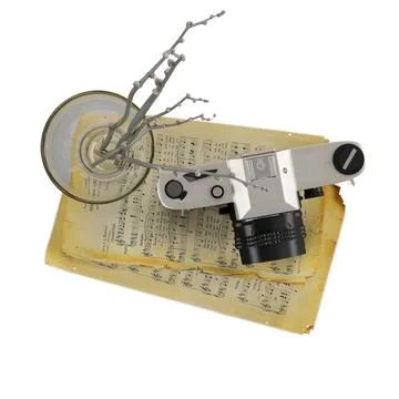 An old analog camera on top of papers, and a glass, 3d rendering Illustrazione stock