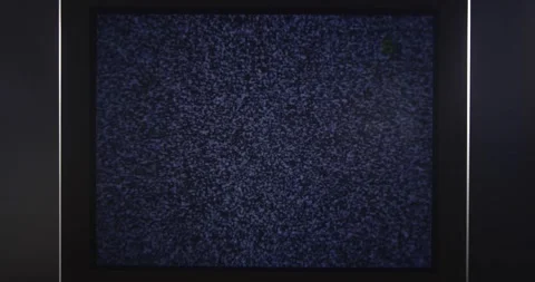 Old analog TV screen broadcasting white noise Stockbeeldmateriaal 201587339