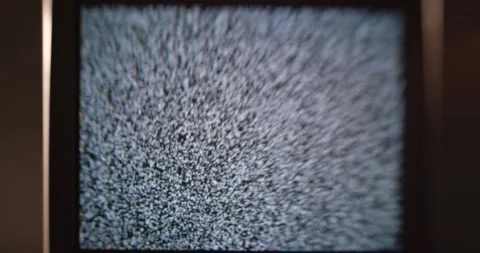 Old analog TV screen broadcasting white noise Видео 201587827