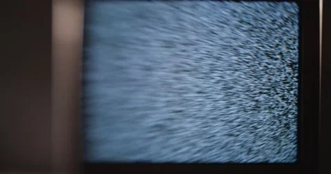 Old analog TV screen broadcasting white noise Stock-Footage 201587856
