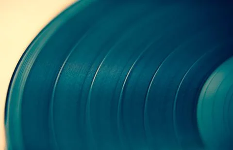 Old analog vinyl record disc with music in close up.Hifi audio equipment for  Stock Photos