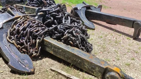 Old anchor. Black anchor of the big sea ship. Huge naval anchor. Stock-Footage 220073663