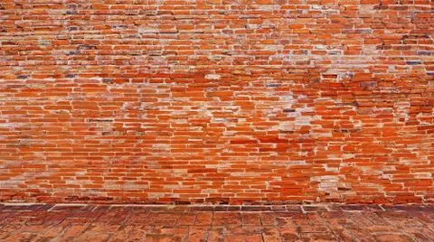Old Ancient brick background with ground brick stone floor tile Stock Photos