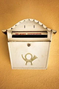 Old ancient mail box on wall Stock Photos