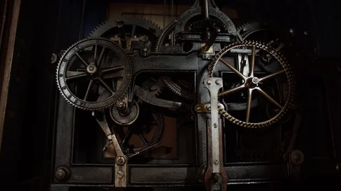 Old ancient medieval machine or clock with cogs in a bell tower 库存影片 107810581