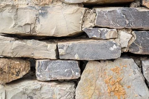 Old ancient stone castle wall up close Stock Photos