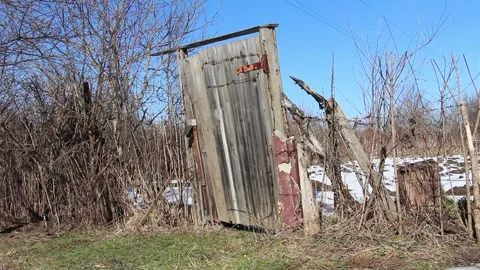 Old and abandoned gate located in rural areas. Old broken gate Stock Footage 150054858