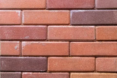 Old and aged red brick wall texture background with vignetting. Stock Photos