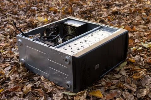 Old and broken computer dumped in a landfill Stock Photos