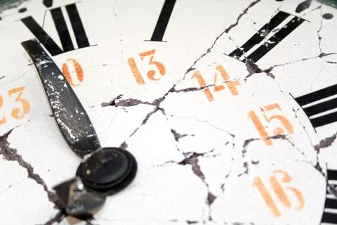 Old and damaged retro clock with roman numeral Stock Photos
