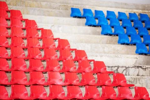 Old and Dirty Empty Plastic Chairs at the Stadium Stock Photos