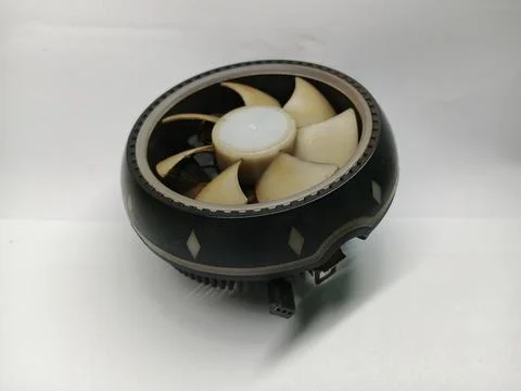 Old and Dusty Computer CPU Cooler Fan on White Background 库存照片