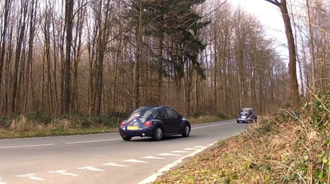 Old and new beetles on the road. Stock Footage 35402006