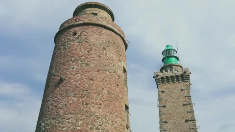 The old and new flagship of Cape Fréhel. Britain. Stock Footage 135811965