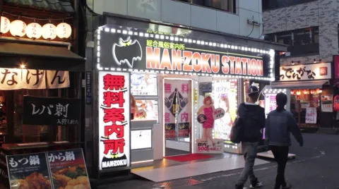 Old and new stores next to each other in Tokyo, Japan Stock Footage 57139082
