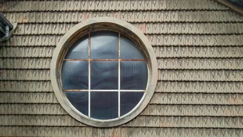 Old and rusty circular skylight in a roof Stock Photos