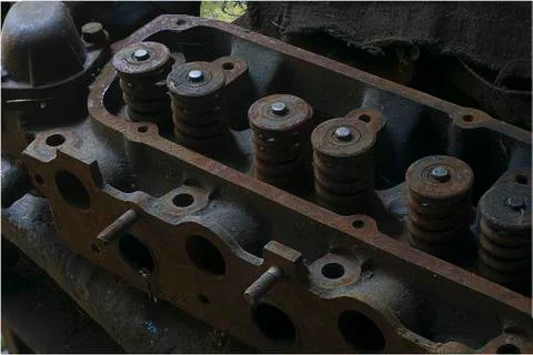 An old and rusty cylinder head cover Stock Photos