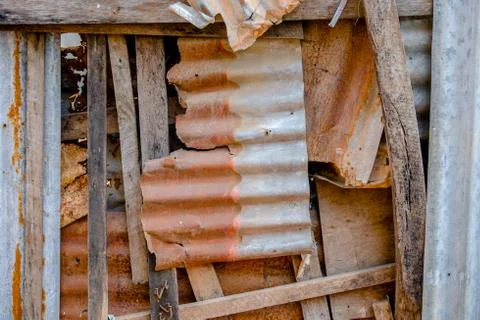 Old and rusty damaged galvanized iron plate. Stock Photos